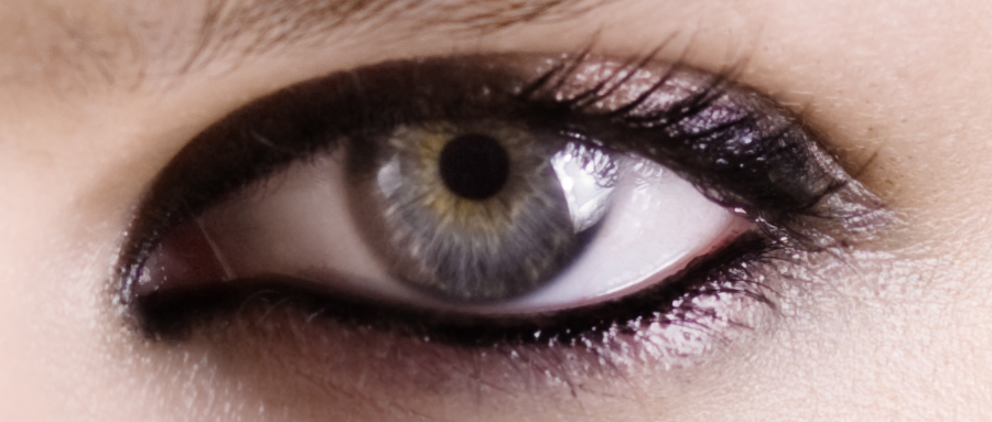 Closeup on an eye made up with an eye pencil, by professional makeup artist Louise Wittlich