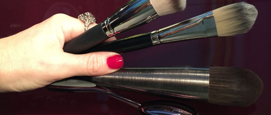 Louise Wittlich's hand, holding her favorite foundation brushes