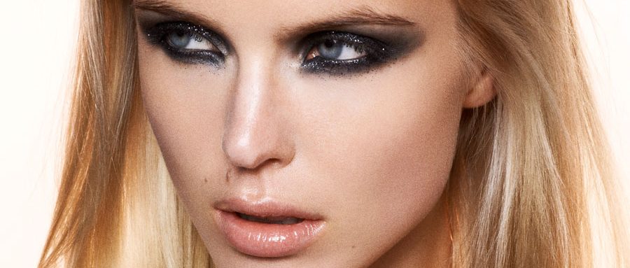Closeup of a young woman wearing a very sexy smokey eye makeup, by makeup artist Louise Wittlich