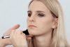 A young woman being made up by Louise Wittlich, withsoftly blended smokey eyes